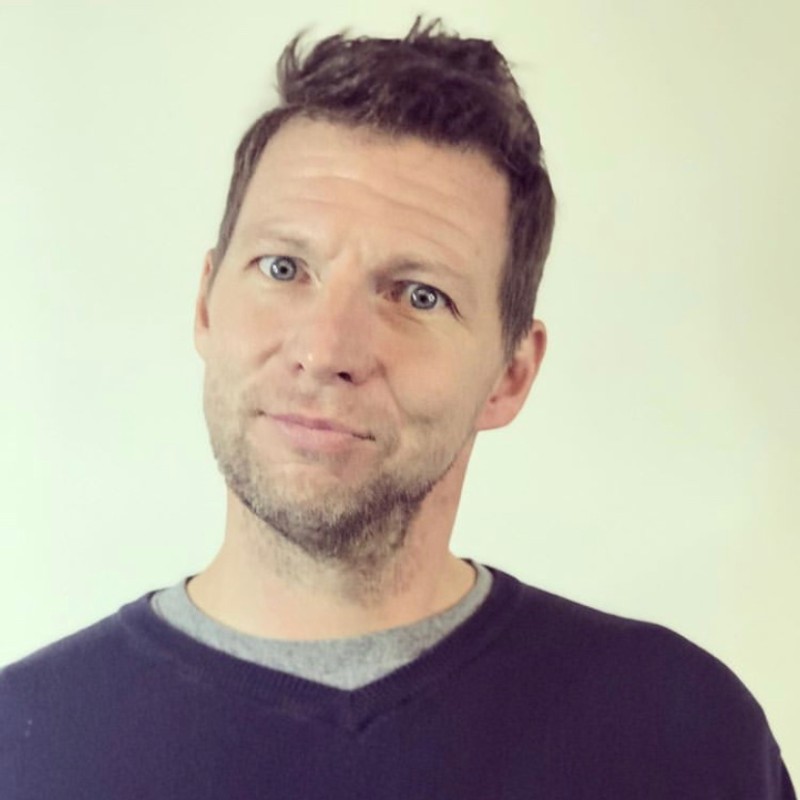 Headshot of Eric Neslon